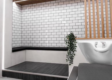 Modern wash area at Move Salon Inchicore, Dublin, County Dublin, IE, with stylish tiles and leafy decor.