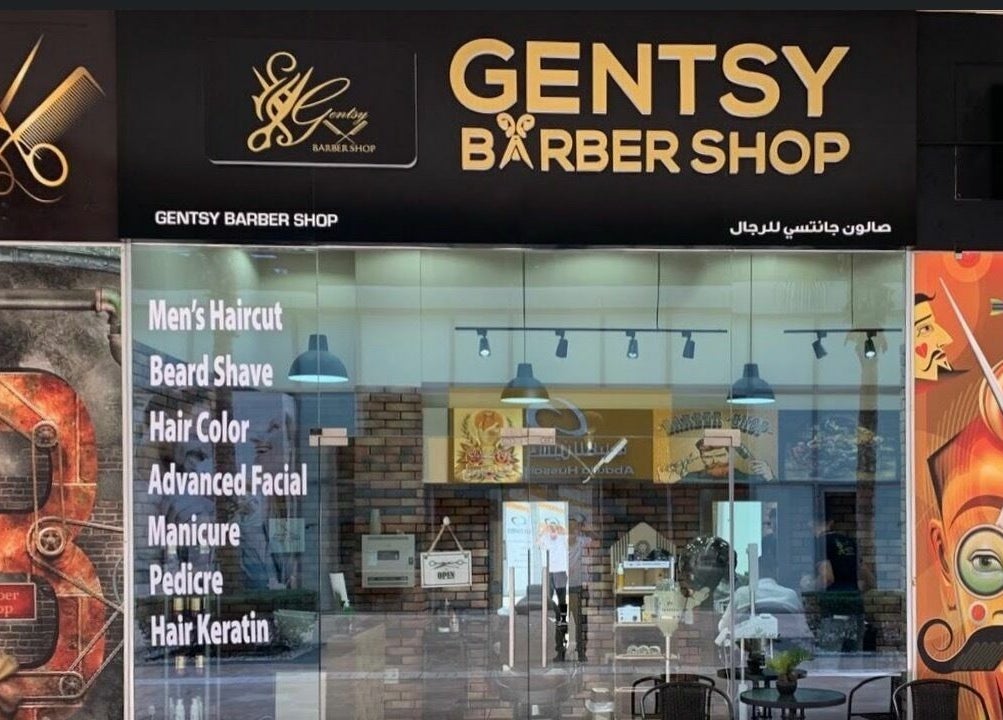 Gentsy Barber Shop facade in Dubai, AE showcases modern design offering haircuts and grooming services.