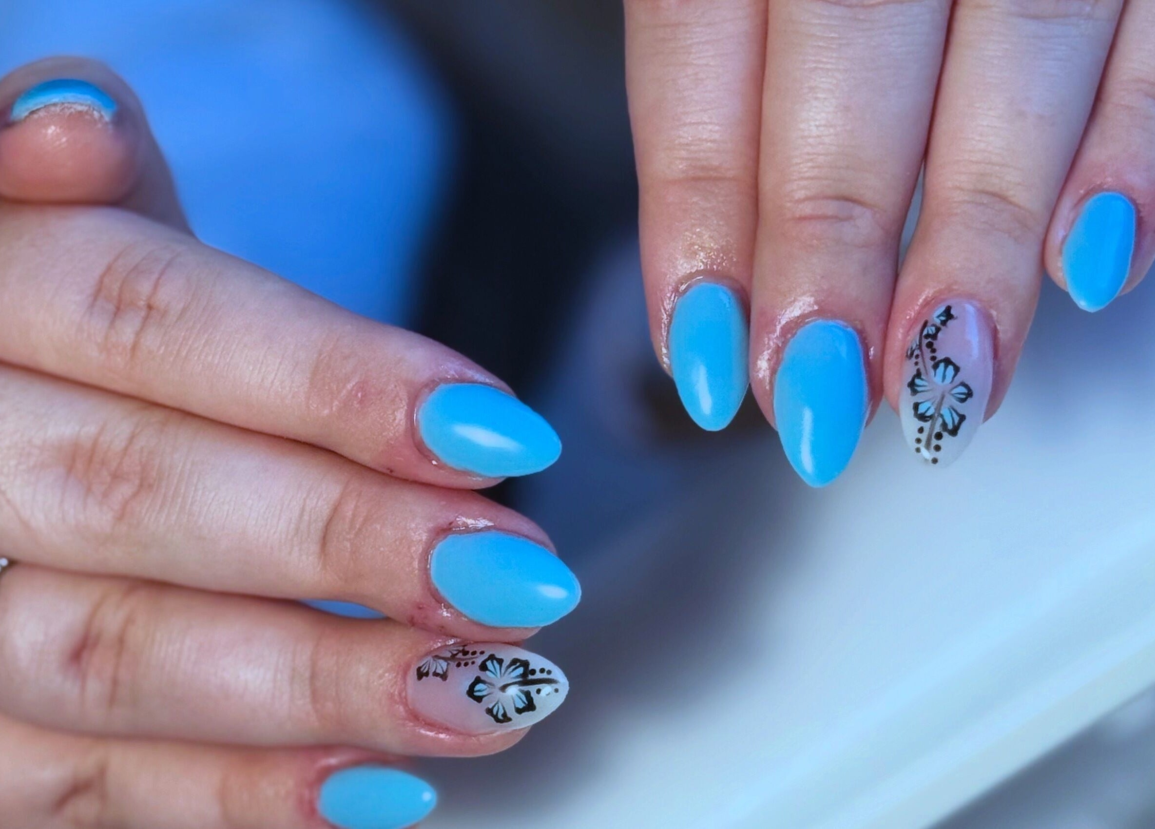 Elegant blue nails with floral art at Elegance in Bloom Co., Ellenbrook, Western Australia, AU.