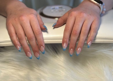 Blue-tipped nails at Elegance in Bloom Co., Ellenbrook, Western Australia, AU showcasing refined style.