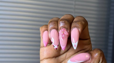 Elegant pink and white nail art with floral design at Niceglamebynicole, Randburg, ZA.