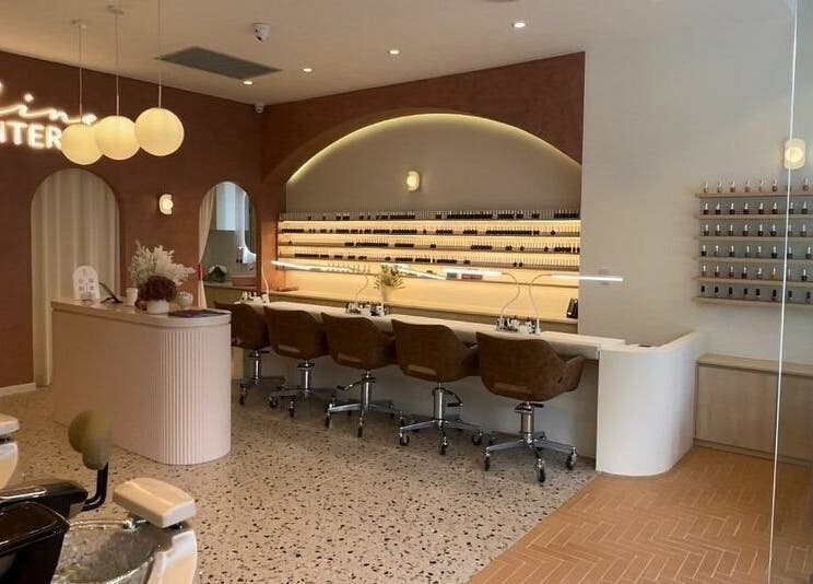 Interior of Blushing on Hunter, Newcastle, New South Wales; stylish salon with manicure stations and serene decor.