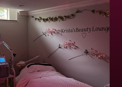 Calming treatment room at kristasbeautylounge, Vaughan, Ontario, CA, featuring soft lighting and floral decor.
