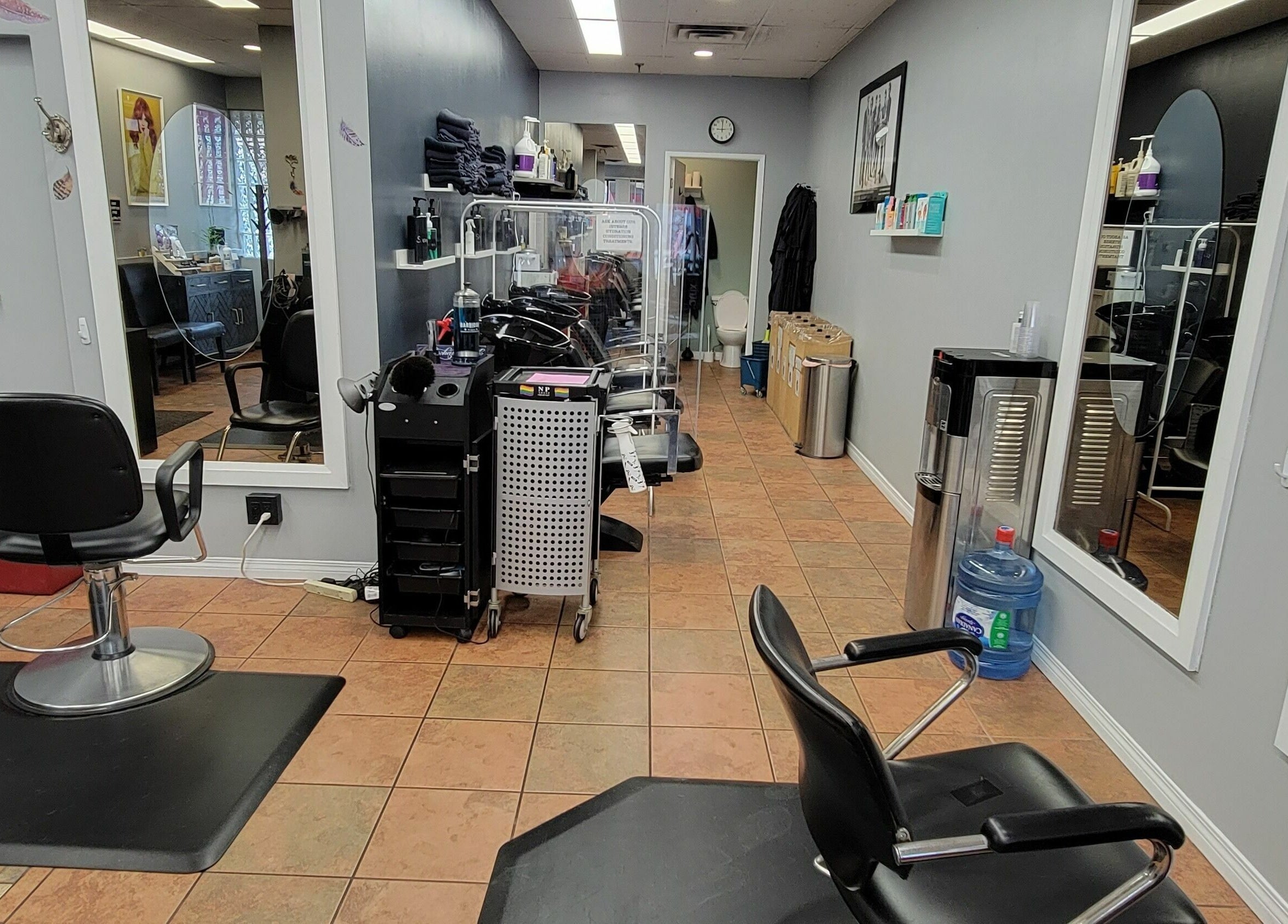 Modern salon chair setup at Visible Changes Hair Design in Calgary, Alberta, CA.