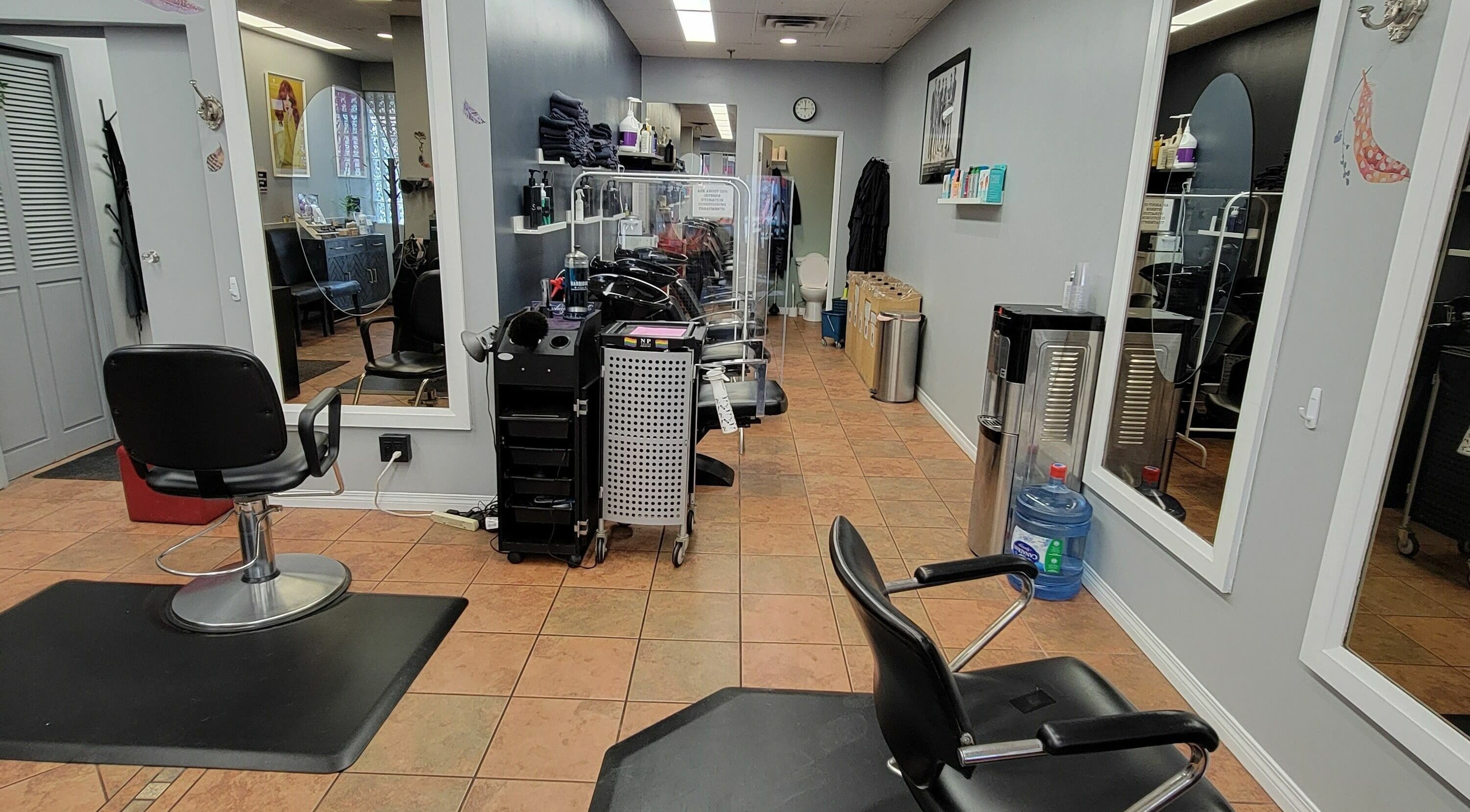 Modern salon chair setup at Visible Changes Hair Design in Calgary, Alberta, CA.