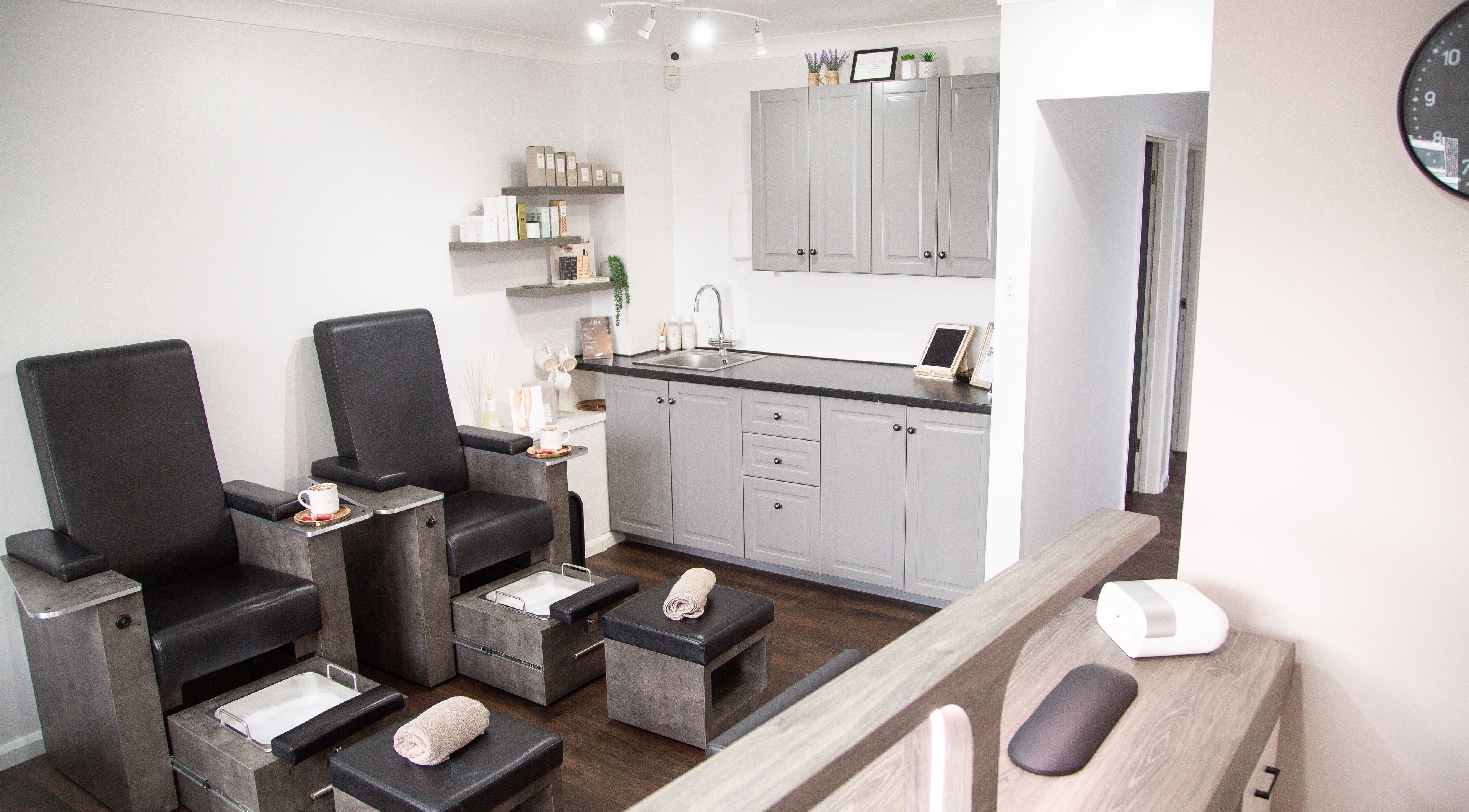 Luxurious nail spa chairs at Evermore Beauty, Brandon, England, GB showcasing a modern setup.
