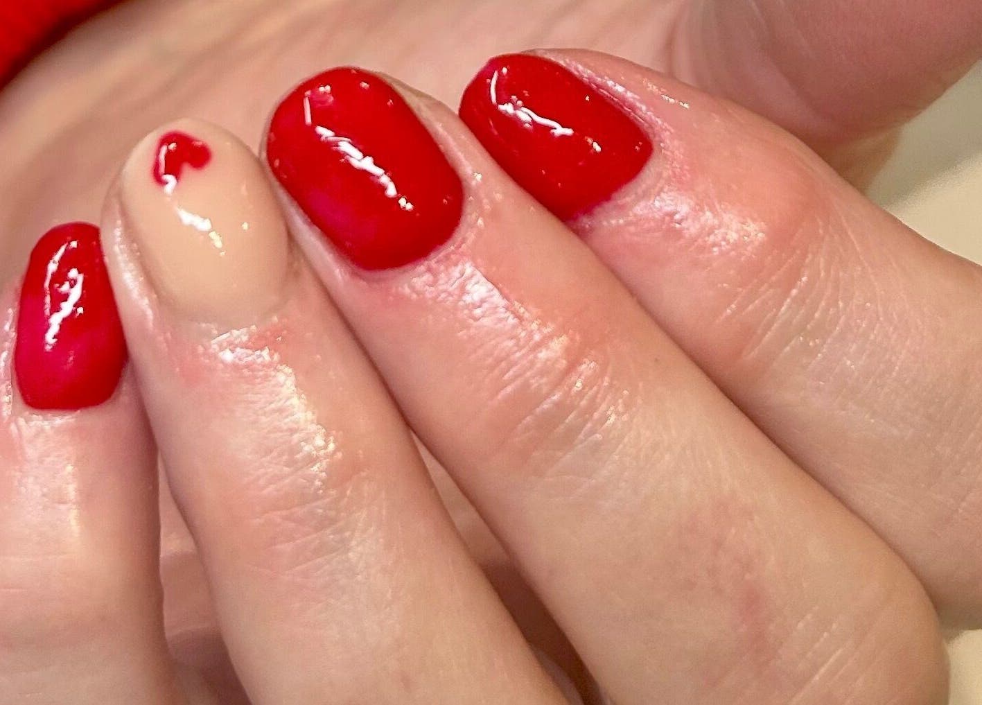 Stylish red manicure at Be Beautiful by Kasey, Contin, Scotland, GB. Nail art at its finest.