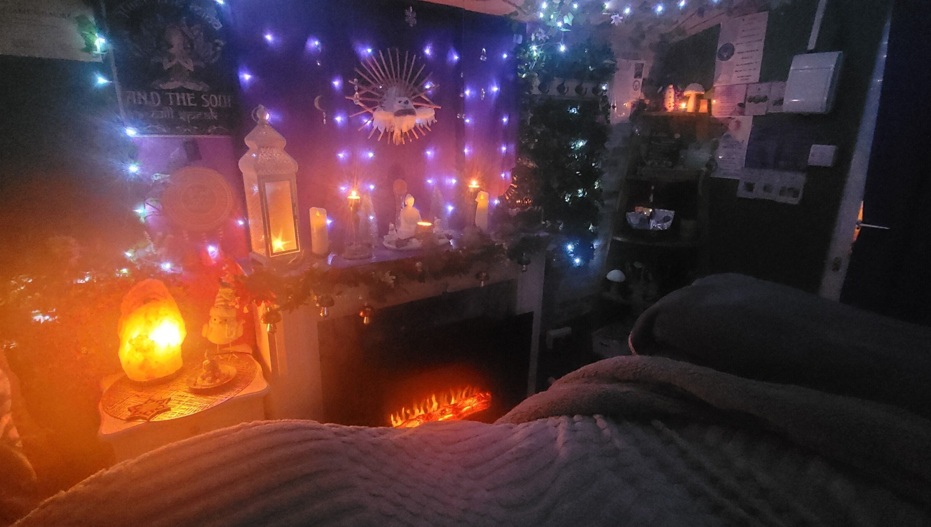 Warm, ambient therapy room at Magical Owl Holistic Therapy in Ash Nr Canterbury, England, GB with glowing candles.