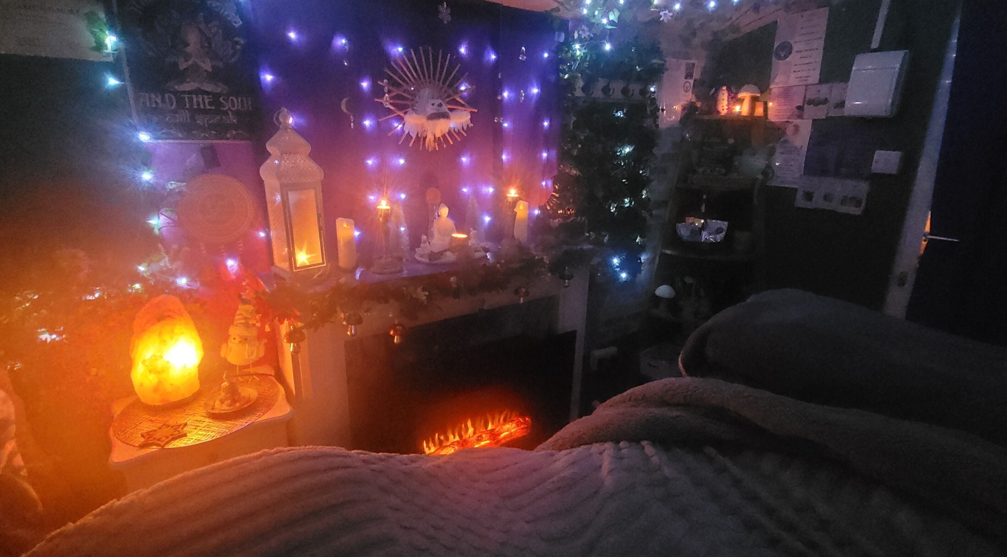 Warm, ambient therapy room at Magical Owl Holistic Therapy in Ash Nr Canterbury, England, GB with glowing candles.