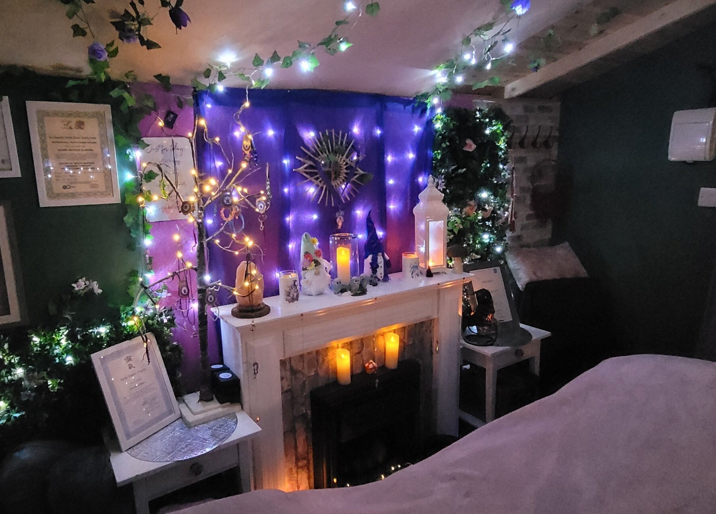Enchanting therapy room at Magical Owl Holistic Therapy in Ash Nr Canterbury, England, GB adorned with candles and lights.