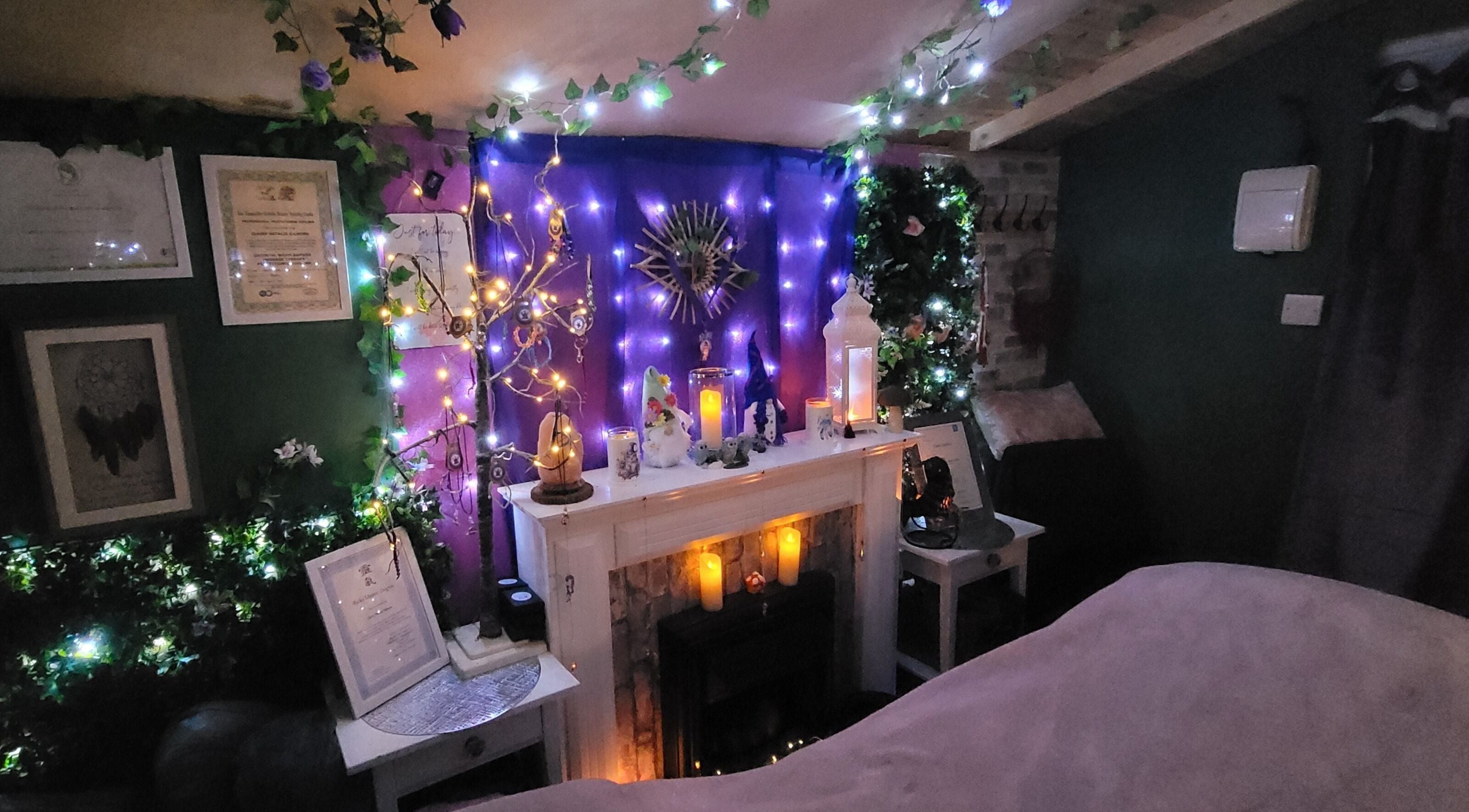 Enchanting therapy room at Magical Owl Holistic Therapy in Ash Nr Canterbury, England, GB adorned with candles and lights.
