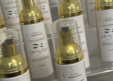 Golden lash cleansers on display at Lashes By Nyah, Rugby, England, GB. Designed for eyelash extensions.