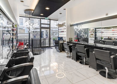 Luxurious interior of Shique London salon in London, England, GB with sleek design and modern furnishings.