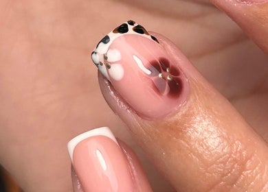 Detailed nail art design at The Gellab, Wath Upon Dearne, England, GB. Featuring intricate floral and dot patterns.