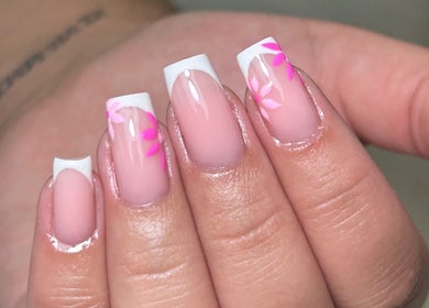 Pink floral French manicure at The Gellab, Wath Upon Dearne, England, GB—elegant and stylish nail art.