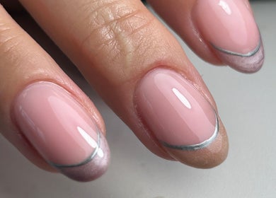 Elegant pink manicure at The Gellab, Wath Upon Dearne, England, GB, featuring silver accents.