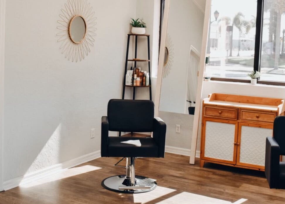 Modern styling chair at Highs & Lows Hair Studio in Fort Pierce, Florida, US offers a stylish haircut experience.