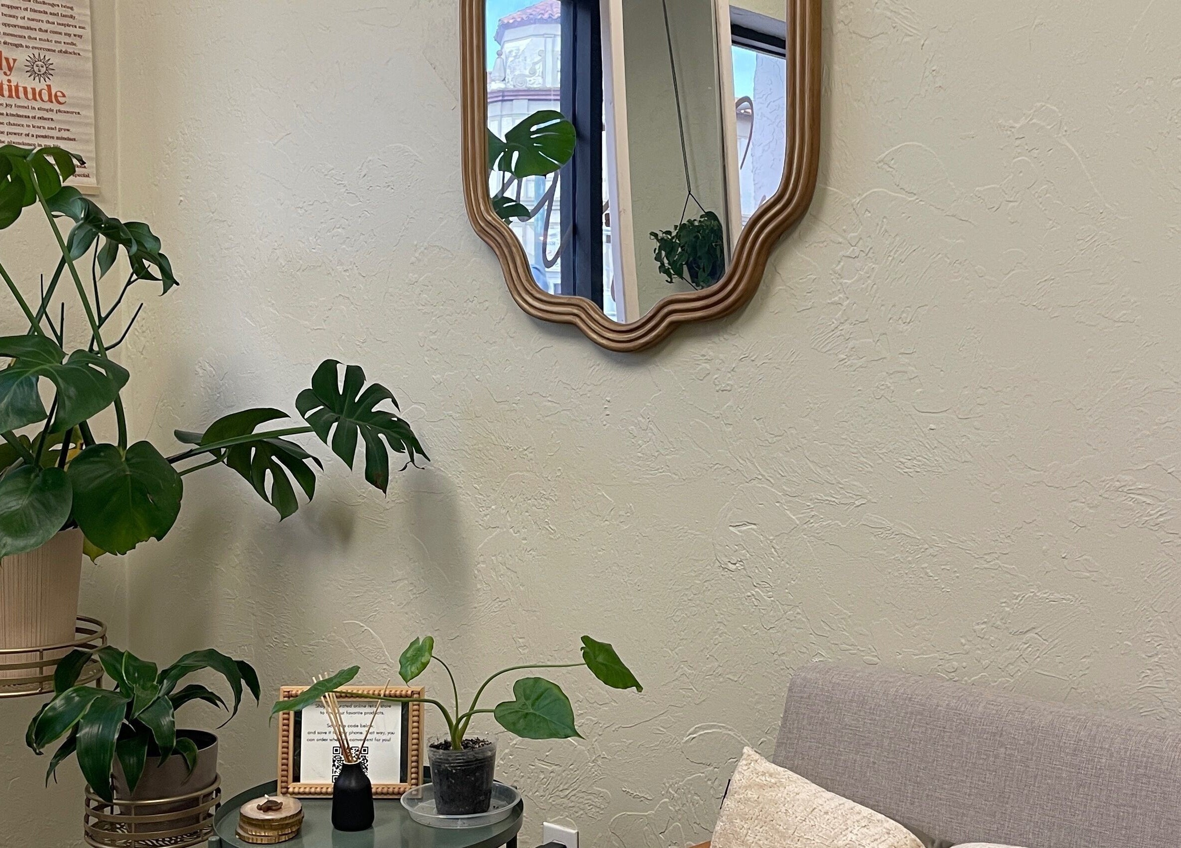 Relaxing plant-filled corner at Highs & Lows Hair Studio in Fort Pierce, Florida, US.