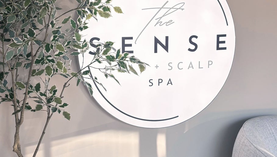 Signage at The Sense Head + Scalp Spa-Mountain View, Mountain View, California, US, with greenery decor.