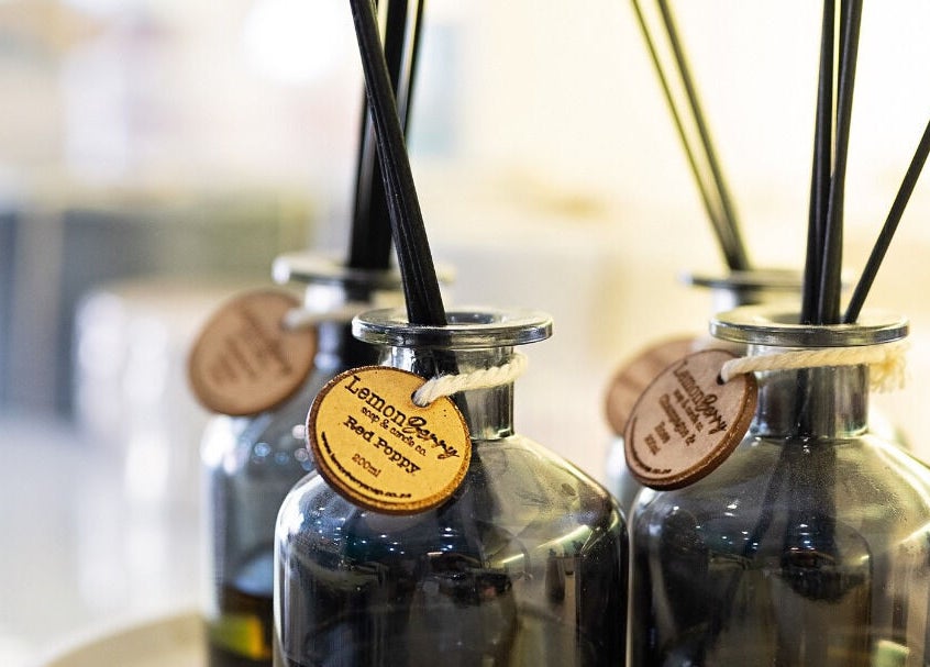 Elegant diffuser bottles at Lemon Berry Nail Bar, Randburg, Gauteng, ZA, enhancing a relaxing atmosphere.