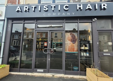 Front view of Carly at Artistic Hair Co., located in Bristol, England, GB, showcasing the elegant salon entrance.