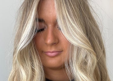 Stylish blonde waves at Envy Hair Company in Fort Pierce, Florida, US.
