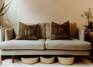 Stylish lounge at Hair by Danika Cahill, Vancouver, British Columbia, CA with plush decor and plants.