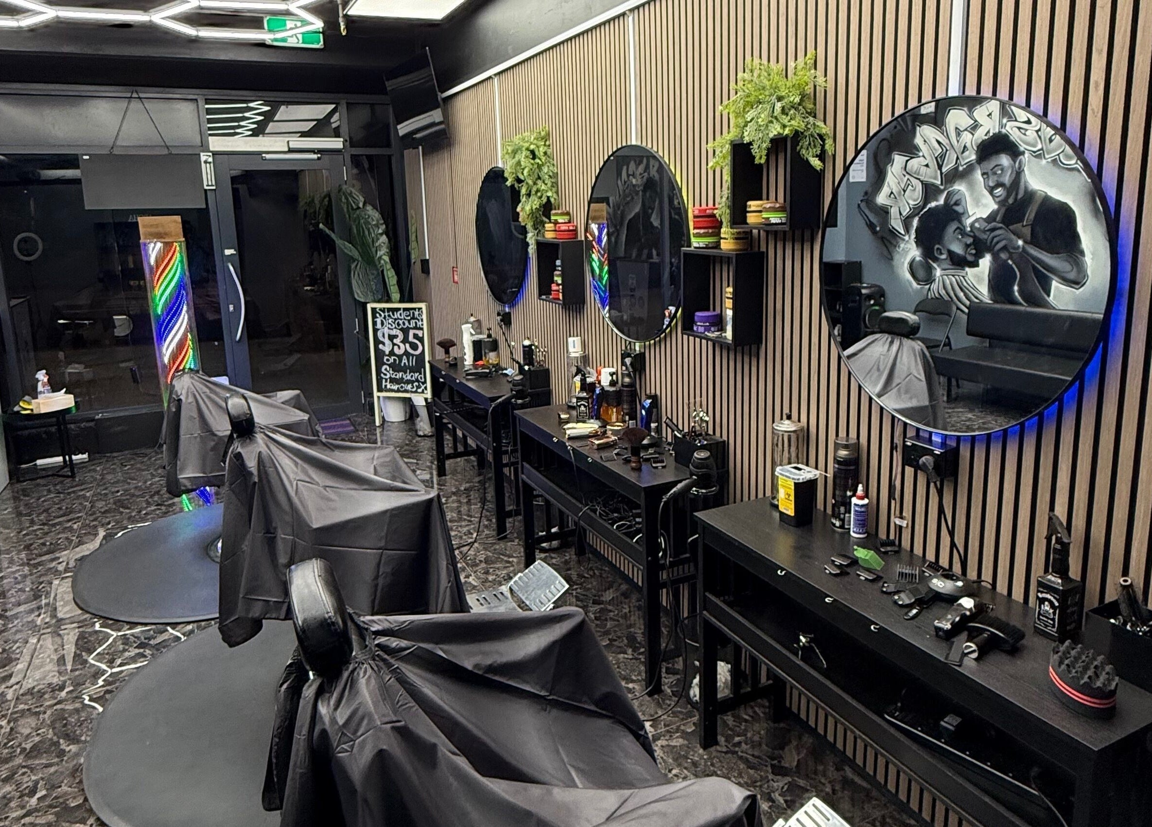 Musa’s Barber Auckland interior with chic decor and modern barber stations. Located in Auckland, Auckland, NZ.