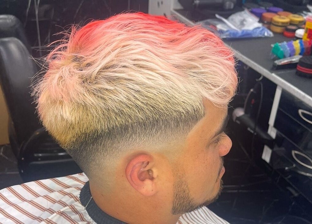 Stylish men's haircut with dyed tips at Musa’s Barber Auckland, Auckland, Auckland, NZ.