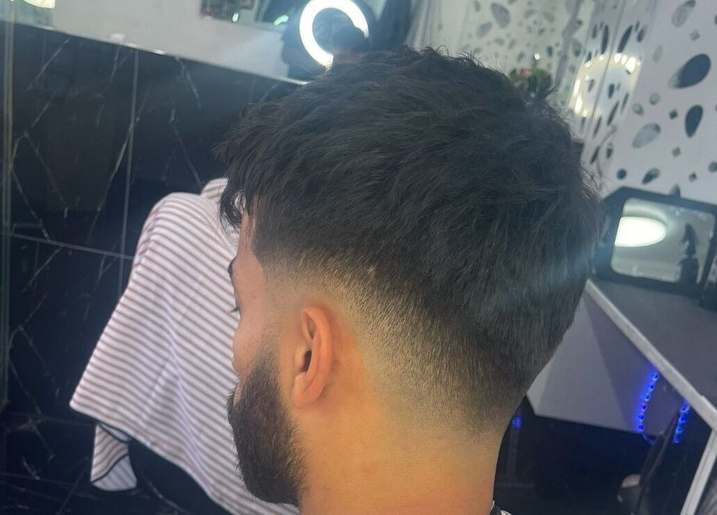 A sharp haircut at Musa’s Barber Auckland, showcasing a precise fade in Auckland, NZ.