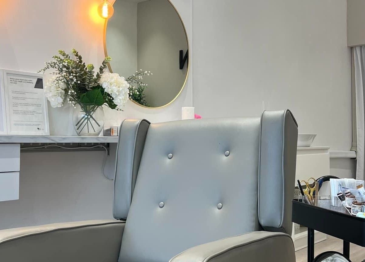 Elegant beauty salon chair at The Brow Design Co, Bentleigh East, Victoria, AU, with modern decor and soft lighting.