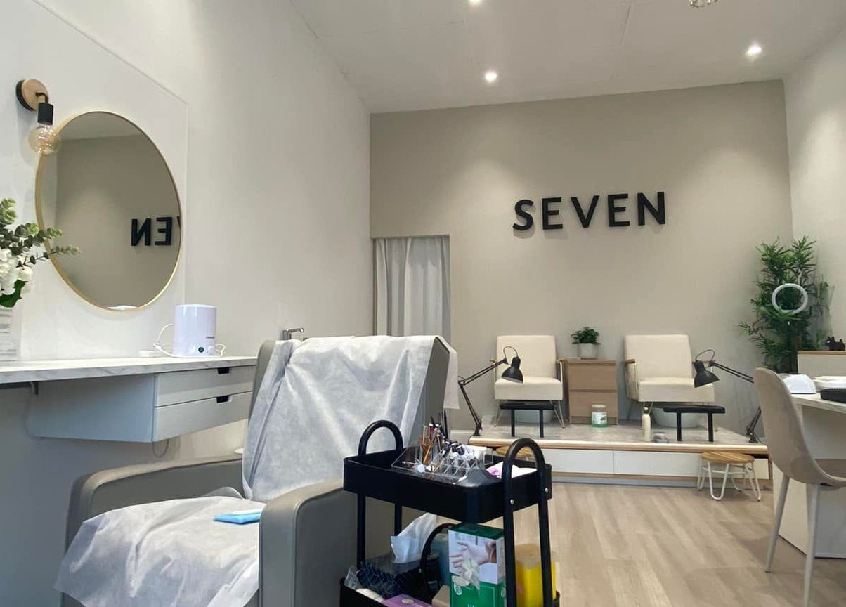 Elegant salon interior at The Brow Design Co, Bentleigh East, Victoria, AU featuring chic decor and plush seating.