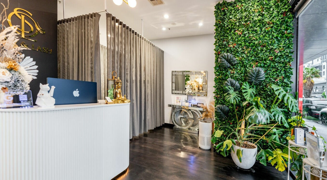 Sophisticated Sol Brow and Lash reception in Melbourne, Victoria, AU with greenery wall and elegant decor.
