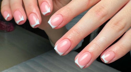 Stylish manicured nails at Charrpillbeauty, Harrogate, England, GB showcasing a modern French design.