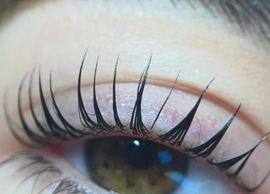 Close-up of elegant eyelash extensions at Charrpillbeauty, Harrogate, England, GB, showcasing expert beauty service.