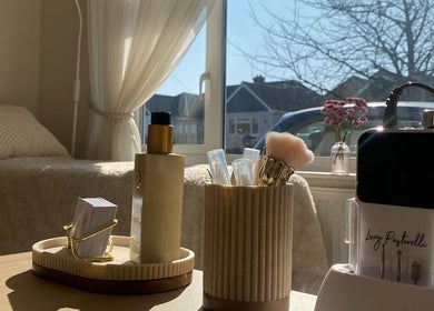 Cozy beauty treatment area at PLBeauty, Thundersley, England, GB with soft lighting and elegant decor.