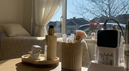 Cozy beauty treatment area at PLBeauty, Thundersley, England, GB with soft lighting and elegant decor.