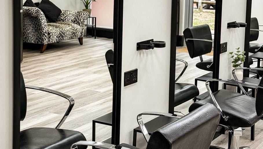 Sleek styling chairs and mirrors at Caylee Heath Bridal Hair, Waterlooville, England, GB.