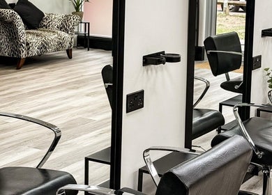 Sleek styling chairs and mirrors at Caylee Heath Bridal Hair, Waterlooville, England, GB.