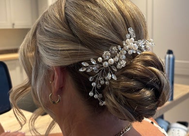 Bridal hair with pearl and crystal accessory by Caylee Heath Bridal Hair, Waterlooville, England, GB.