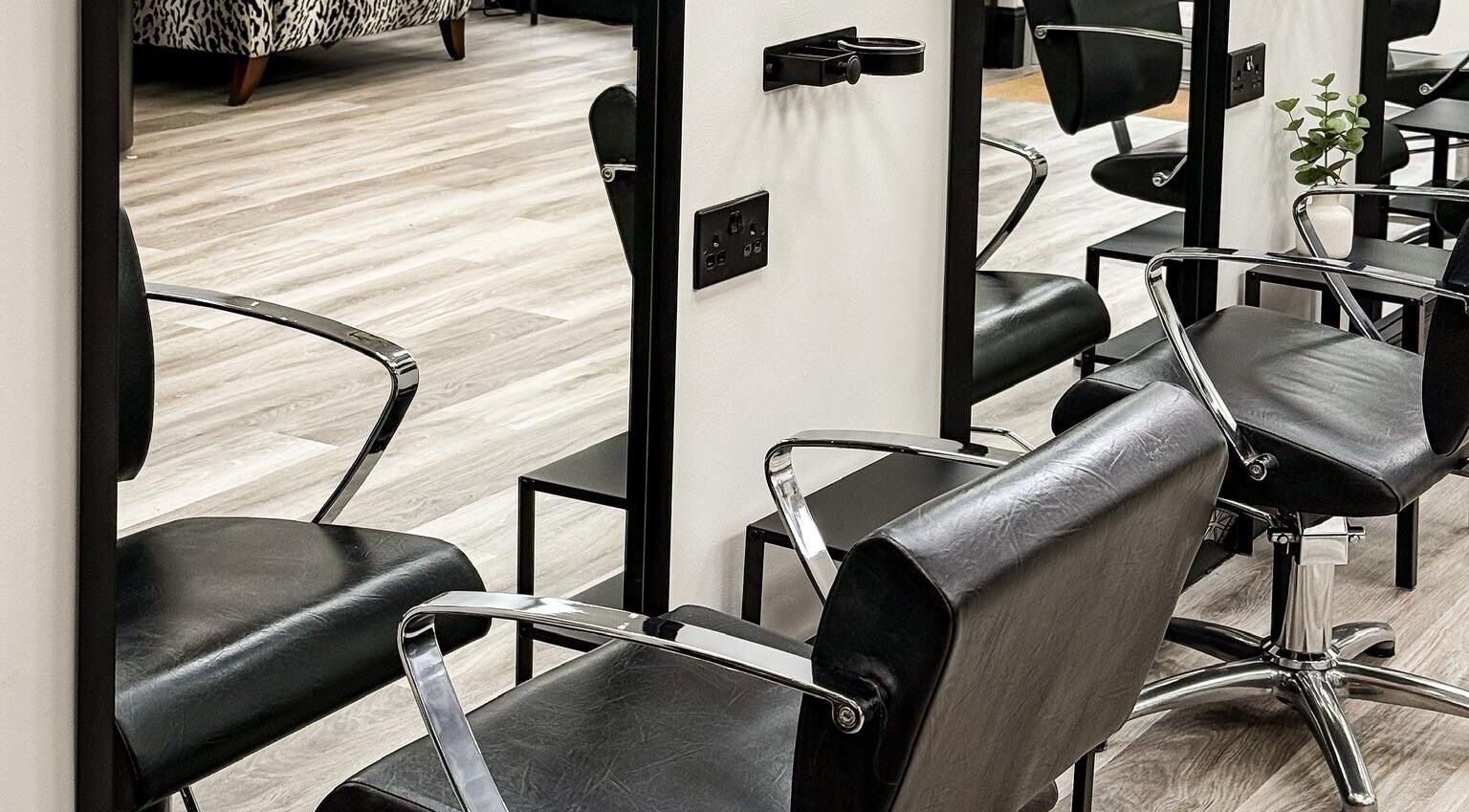 Modern salon chairs at Caylee Heath Bridal Hair in Waterlooville, England, GB.