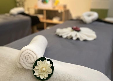 Tranquil massage beds at Panwa Massage and Therapy, Auckland, Auckland, NZ, adorned with elegant white towels.