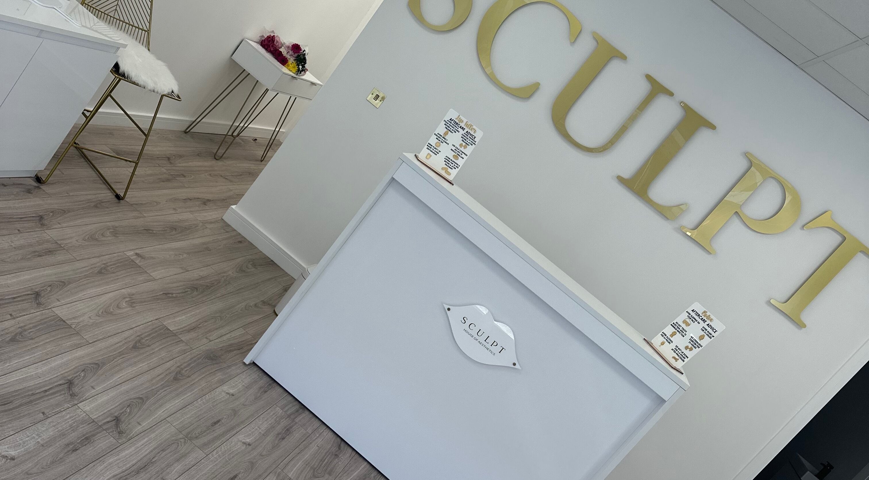 Sculpt House of Aesthetics reception area in Johnstone, Scotland, GB featuring sleek decor and modern design.