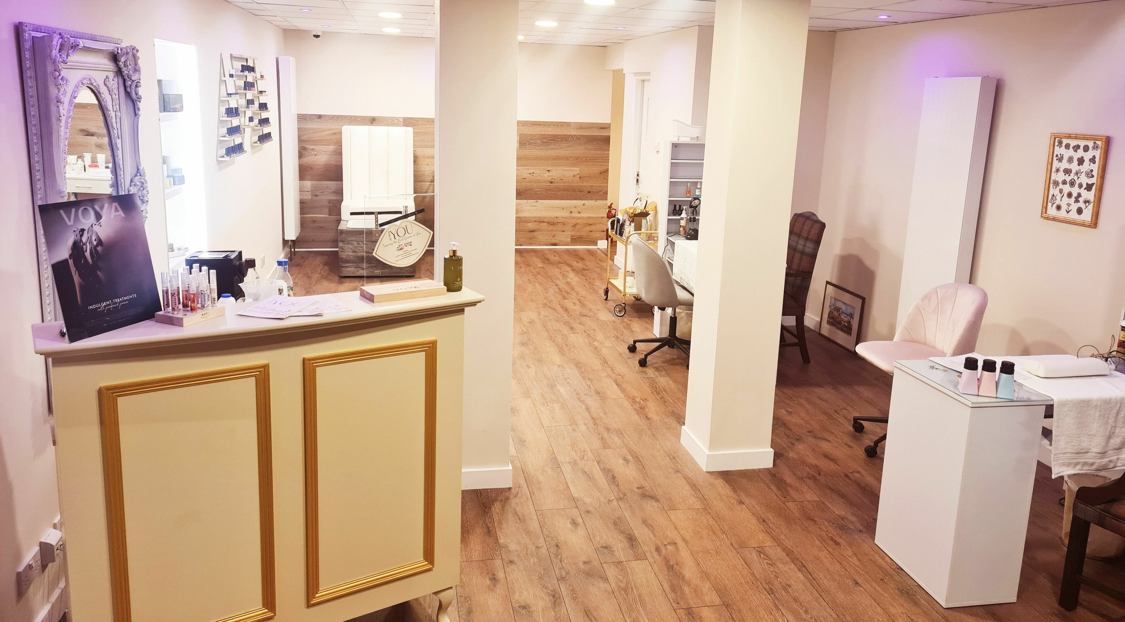Spacious interior of All About You, Blairgowrie, Scotland, GB showing a modern reception and treatment areas.