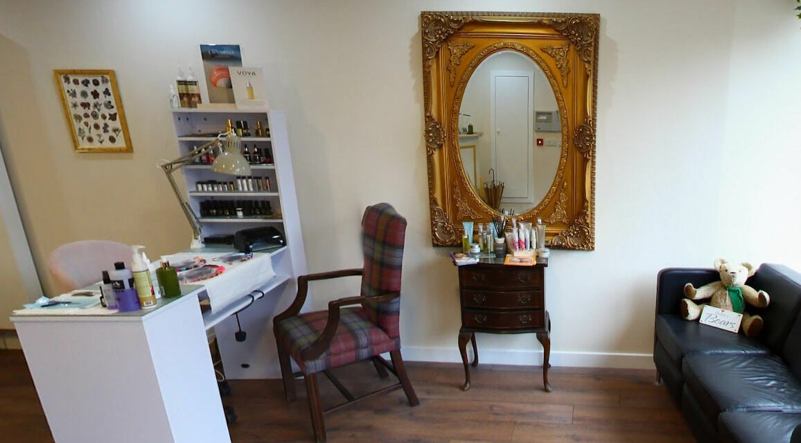 All About You salon in Blairgowrie, Scotland, GB, featuring a stylish interior with a large ornate mirror.
