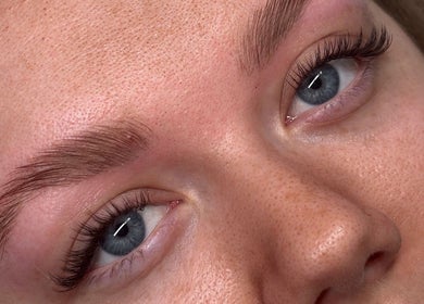 Beautifully groomed eyebrows at Aleighas Beauty in Guildford, England, GB enhance facial aesthetics.