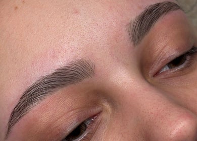 Close-up of perfectly shaped eyebrows at Aleighas Beauty, Guildford, England, GB.