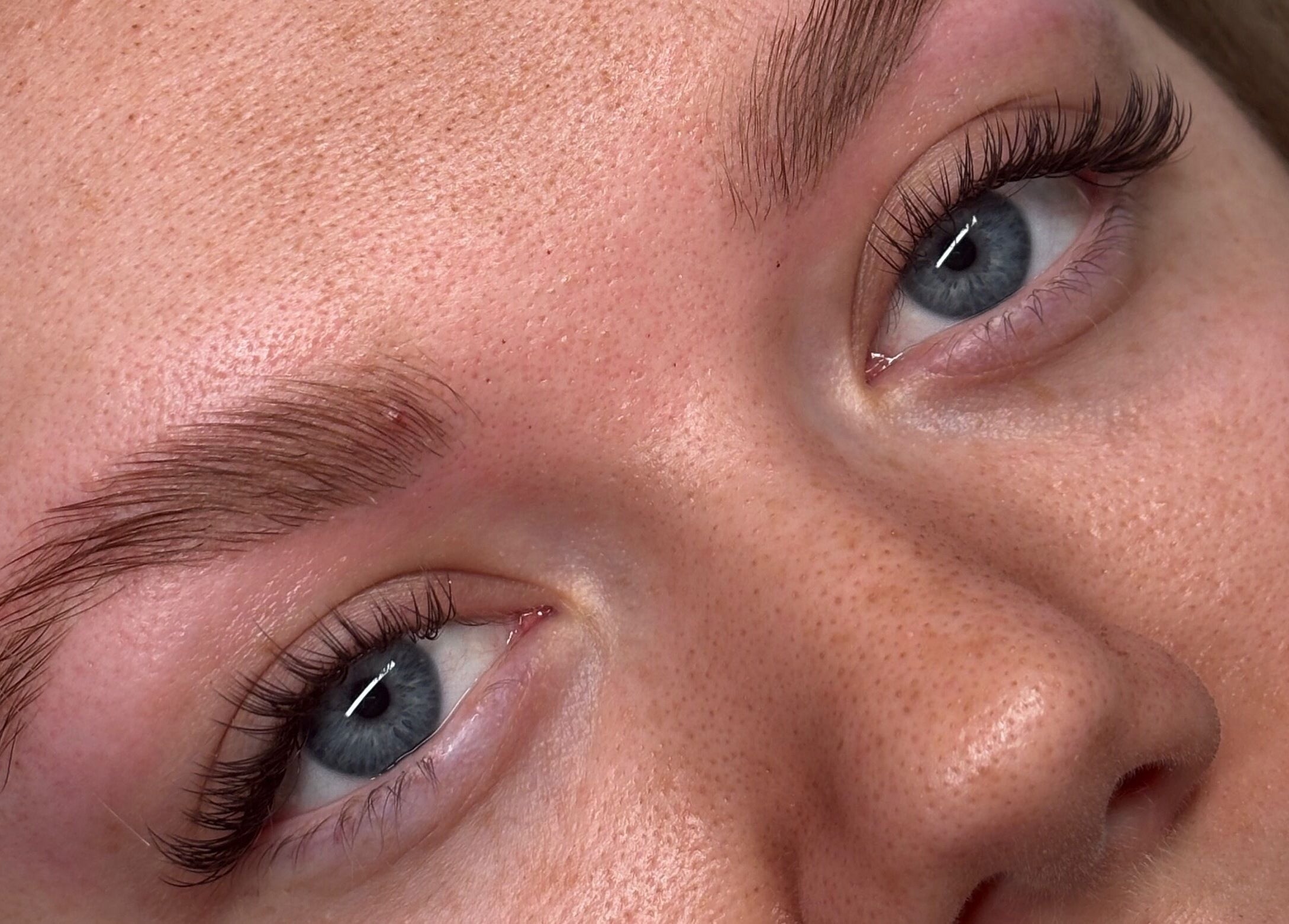 Close-up of expertly groomed brows and lashes at Aleighas Beauty in Guildford, England, GB.