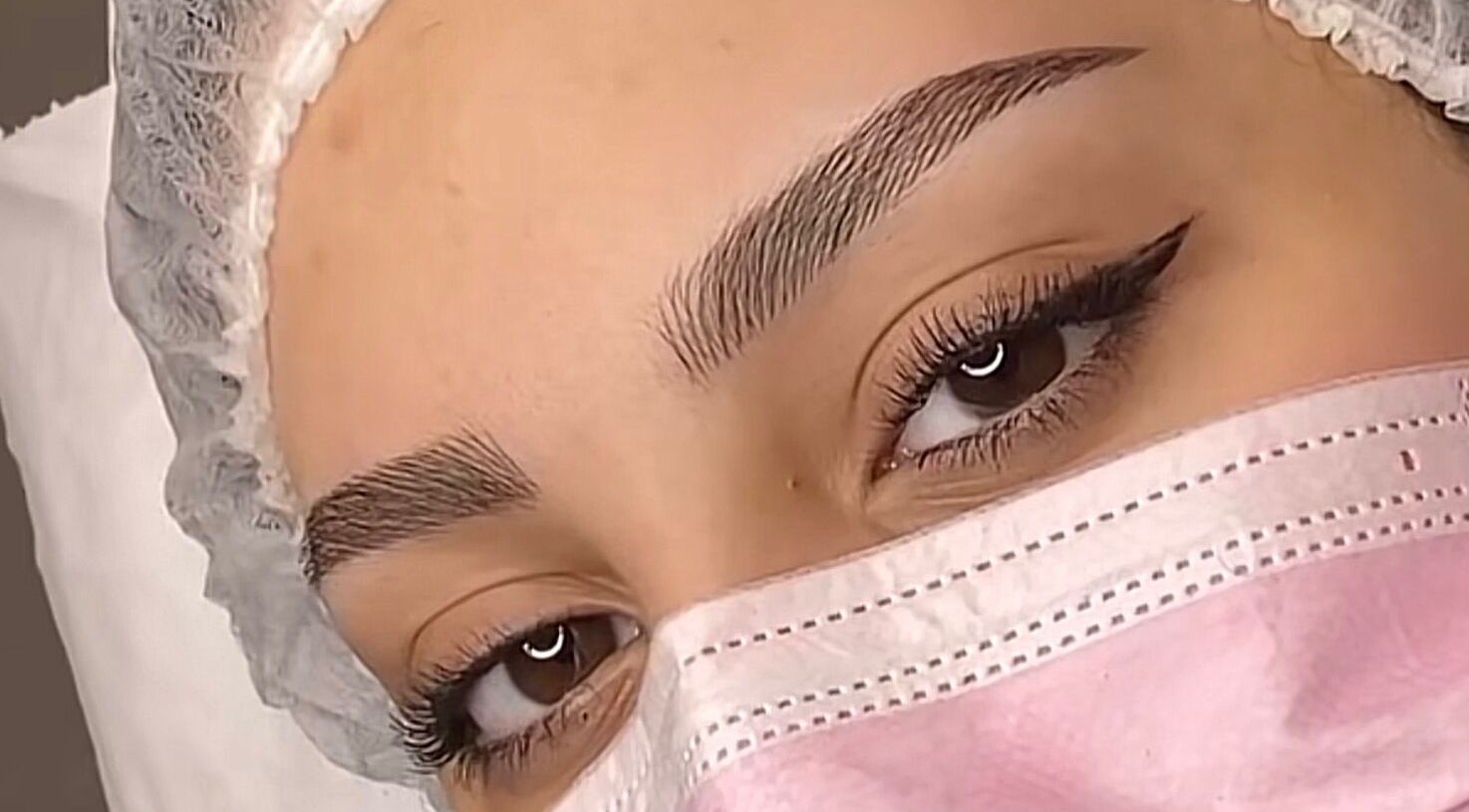 Close-up of expertly shaped eyebrows at Wafaabeaty, New York, New York, US, showcasing precision beauty.