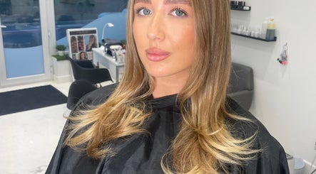 Woman with styled hair at Bymolliefay salon, Runcorn, England, GB.
